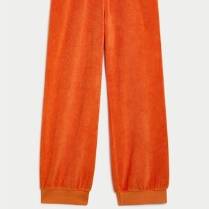 Suzi Kondi the Tosk Harem pants in Terry. Mandarin color. Women’s medium